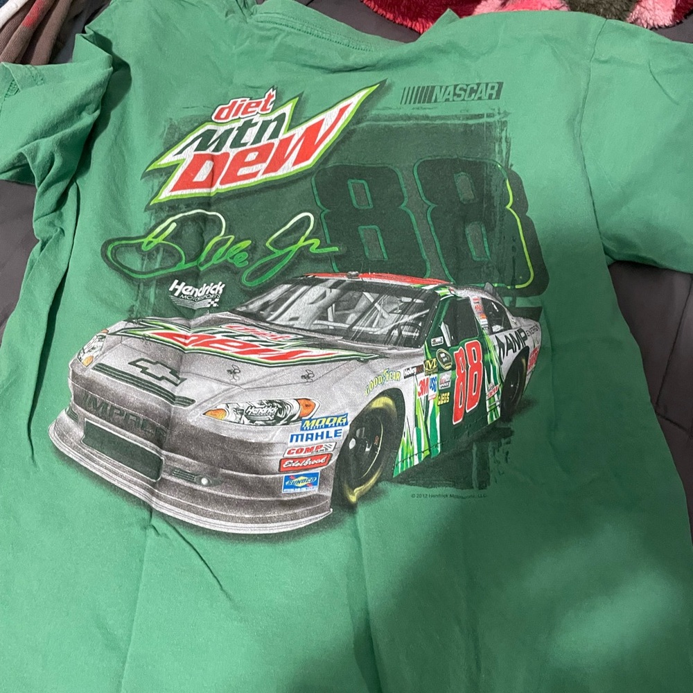 A green Mountain Dew tee shirt